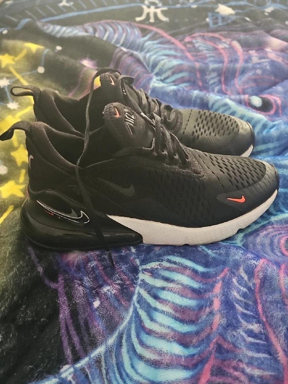 Nike Black Sneakers with Orange Accent and White Sole